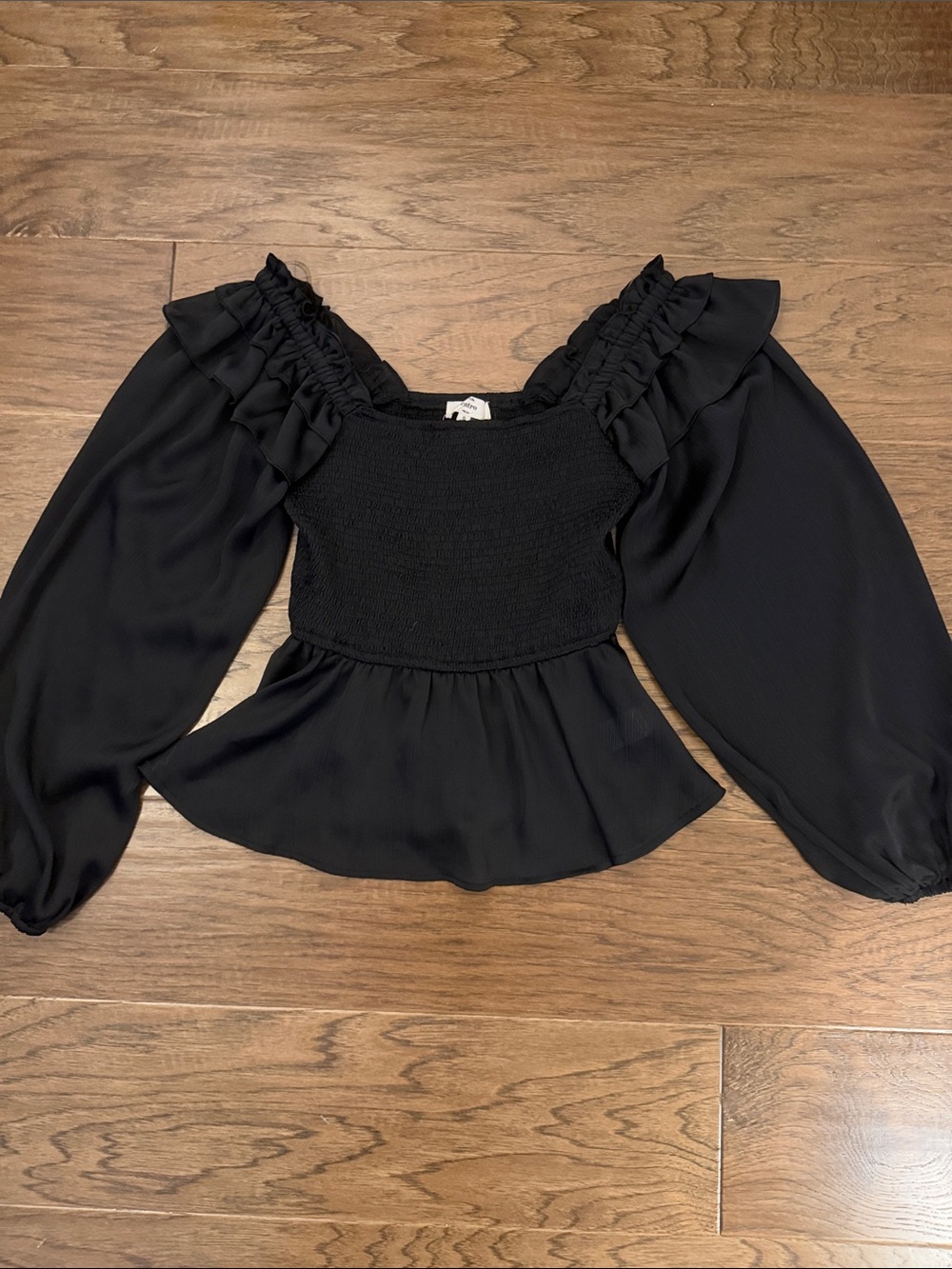 entro Black Smocked Peplum Ruffle Sleeve Blouse